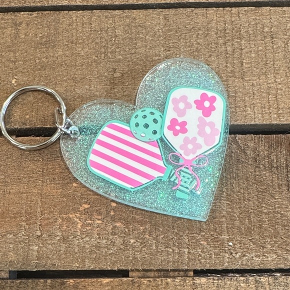 None Accessories - Heart Shaped Glitter Keychain with Floral and Striped Design